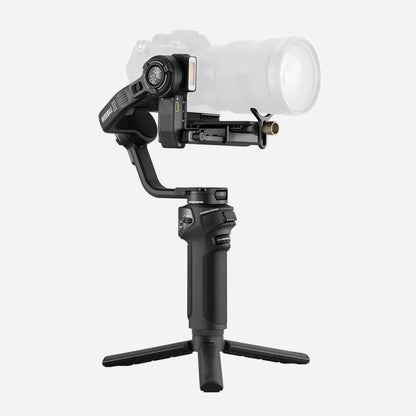 Camera stabilizer with a camera attached on a white background